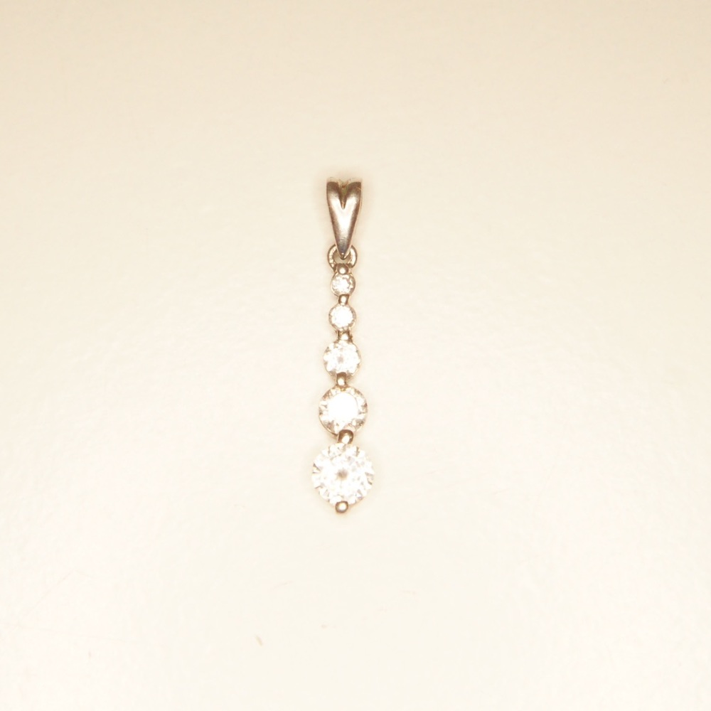 Sterling silver graduated CZ pendant